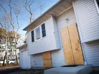 Navigating the Complexities of Acquiring Foreclosed Properties