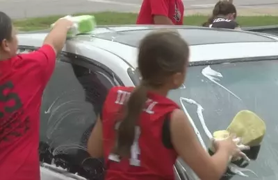 Young Softball Team Fundraises for Championship Tournament