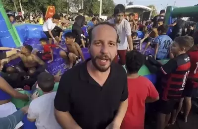 Global TikTok Star Joins Footballer in Heartwarming Charity Appearance