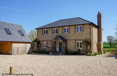 Property Market Downturn: Leading Estate Agent Revises House Price Forecasts Downwards Amidst Oversupply and Budget Uncertainty
