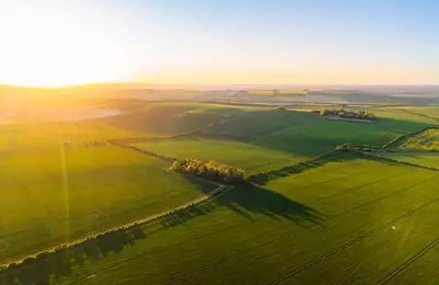 Gladstone Land Navigates Agricultural Headwinds: A Strategic Shift Towards Sustainable Earnings