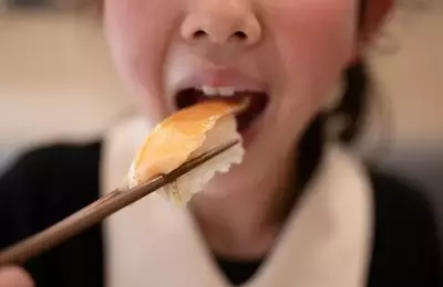 Kura Sushi Faces Headwinds: Downgrade to Sell Amid Declining Traffic and Soaring Costs
