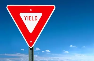 The Looming Showdown: Real Rates, Debt, and TIPS