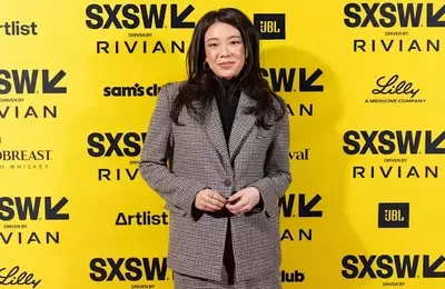 Vivian Tu's Financial Advice: Prioritizing Debt Repayment Over Investing
